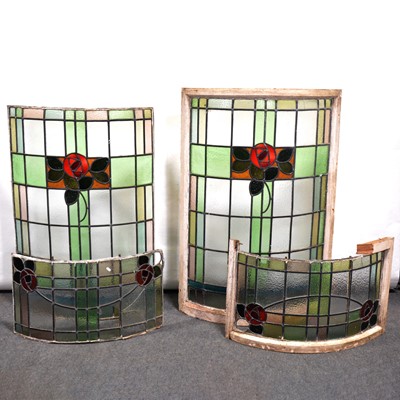 Lot 152 - Two large bowed leaded and stained glass windows, in the Arts and Crafts style