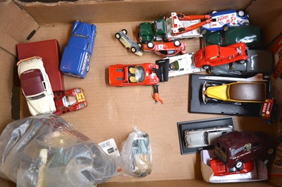 Lot 84 - A box containing die-cast model vehicles, Kidztech RC car, Schylling Rocket Ride Carousel, etc.