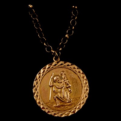 Lot 266 - A 9 carat yellow gold St Christopher medallion on a chain.