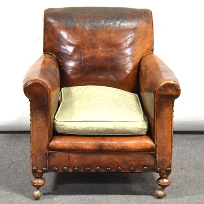 Lot 475 - 1940's brown leather upholstered easy chair