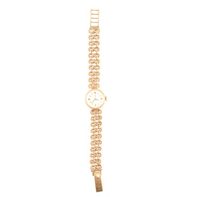 Lot 409 - Tudor Royal - a lady's 9 carat yellow gold bracelet wristwatch.