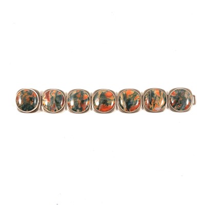 Lot 206 - Bent Knudsen - a moss agate and silver panel bracelet.