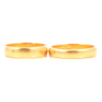 Lot 106 - Two 22 carat gold wedding bands.