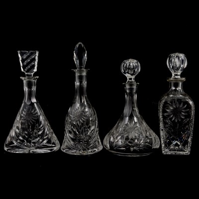 Lot 62 - Four glass decanters with sunflower design.