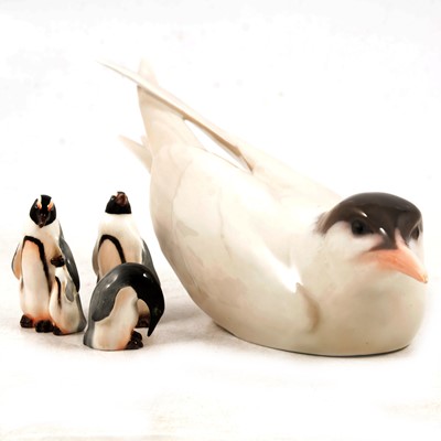 Lot 1 - Royal Copenhagen Squatting Tern and Royal Doulton miniature penguins.