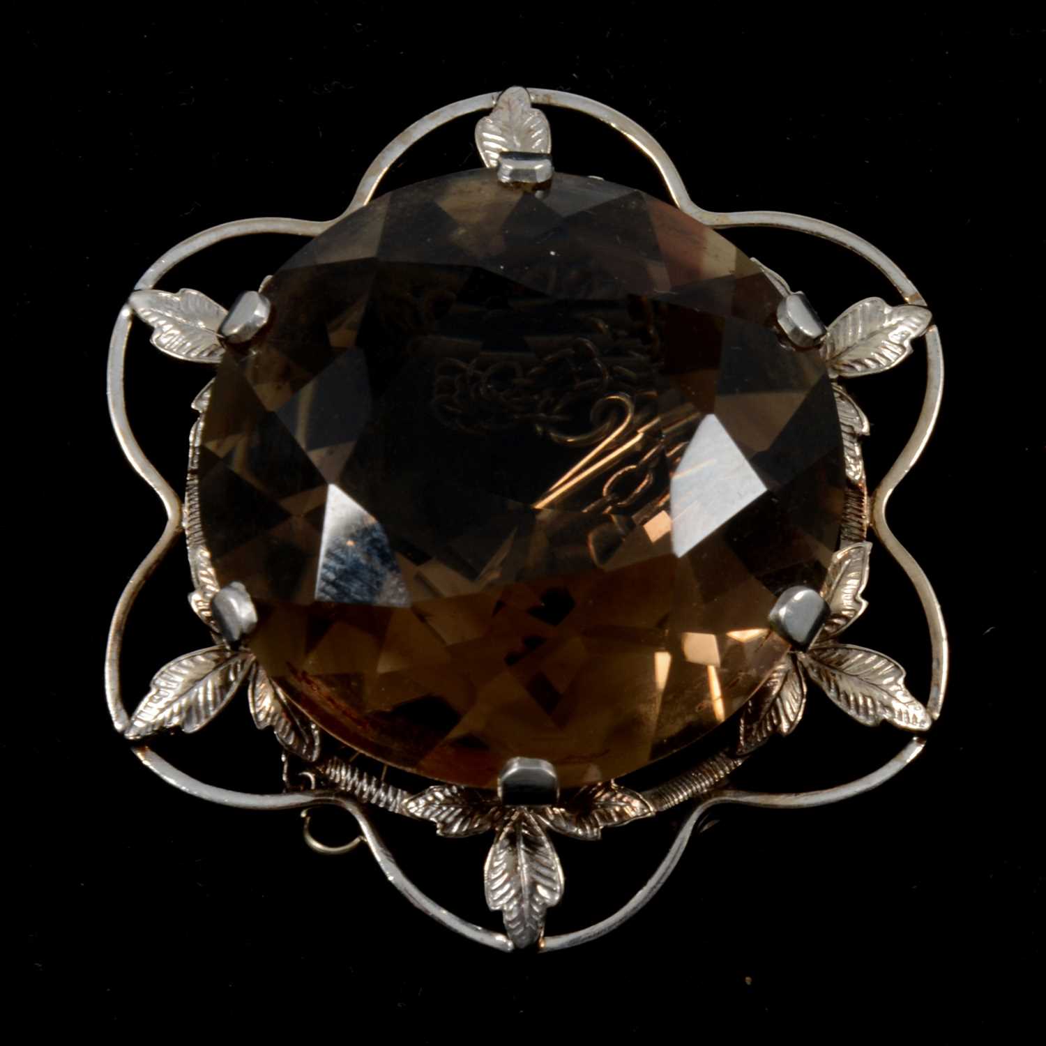 Lot 197 - A smoky quartz brooch.