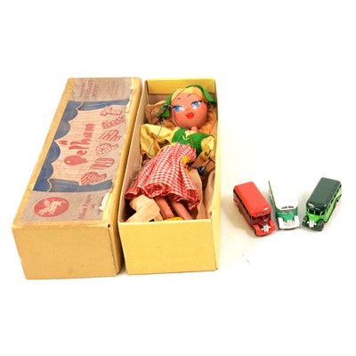 Lot 141 - Pelham Puppet 'Tyrolean Girl', and three die-cast buses
