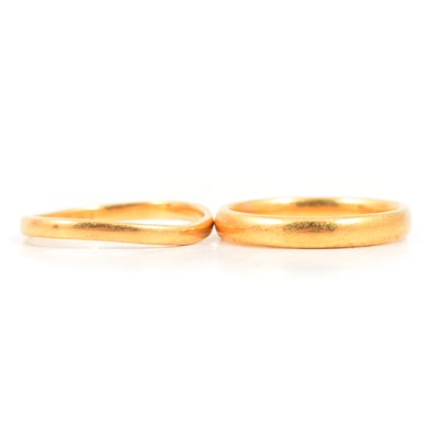 Lot 103 - Two 22 carat gold wedding bands.