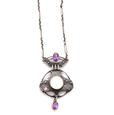 Lot 209 - Murrle Bennett & Co - an Arts & Crafts amethyst and mother-of-pearl white metal pendant necklace.