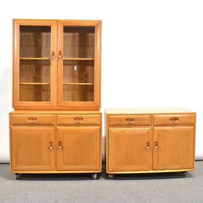 Lot 22 - Two elm sideboard units and  glazed bookcase, by Ercol