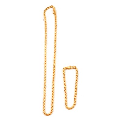 Lot 274 - An 18 carat yellow gold 'Spiga' style necklace and bracelet.