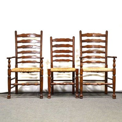 Lot 443 - Set of four Haseblech oak wavy ladderback dining chairs