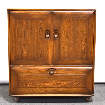 Lot 431 - Ercol elm television cabinet