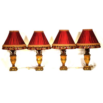 Lot 16 - Set of four gilt composition table lamps