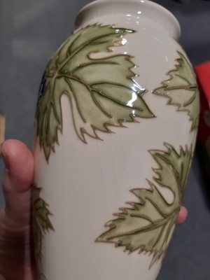 Lot 112 - Sally Tuffin for Moorcroft a vase in the Grapevine design.