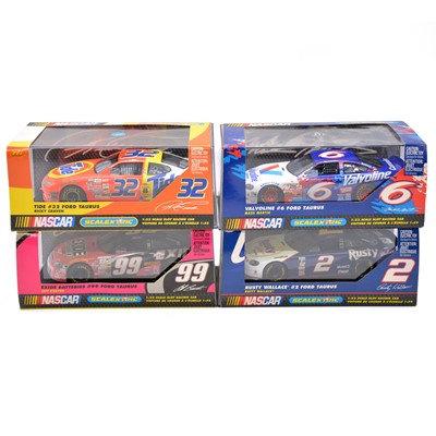 Lot 123 - Four Scalextric NASCAR slot cars, Ford Taurus, boxed