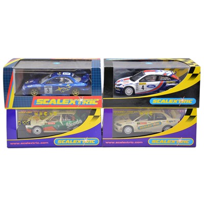 Lot 122 - Four Scalextric WRC slot cars, boxed