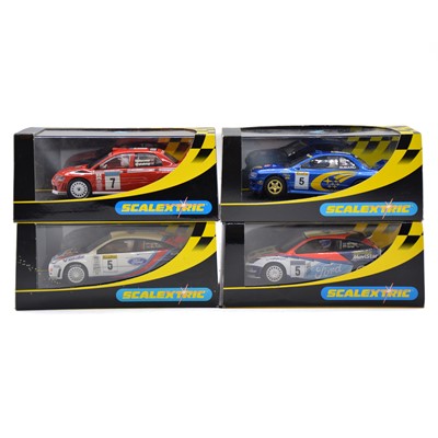Lot 125 - Four Scalextric WRC slot cars, boxed