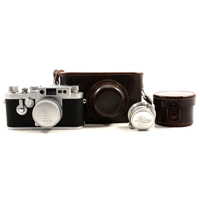 Lot 143 - Leica - a IIIG 35mm camera with box, case, lens hood, Summaron wide angle lens.