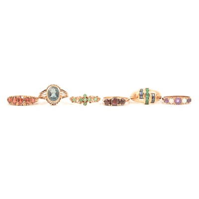 Lot 94 - Six gemset rings, garnet, emerald, sapphire and emerald, amethyst and opal, synthetic blue spinel.