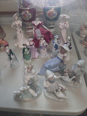 Lot 13 - Collection of Coalport and Nao figurines