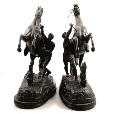 Lot 218 - After Coustou, pair of spelter Marly horses