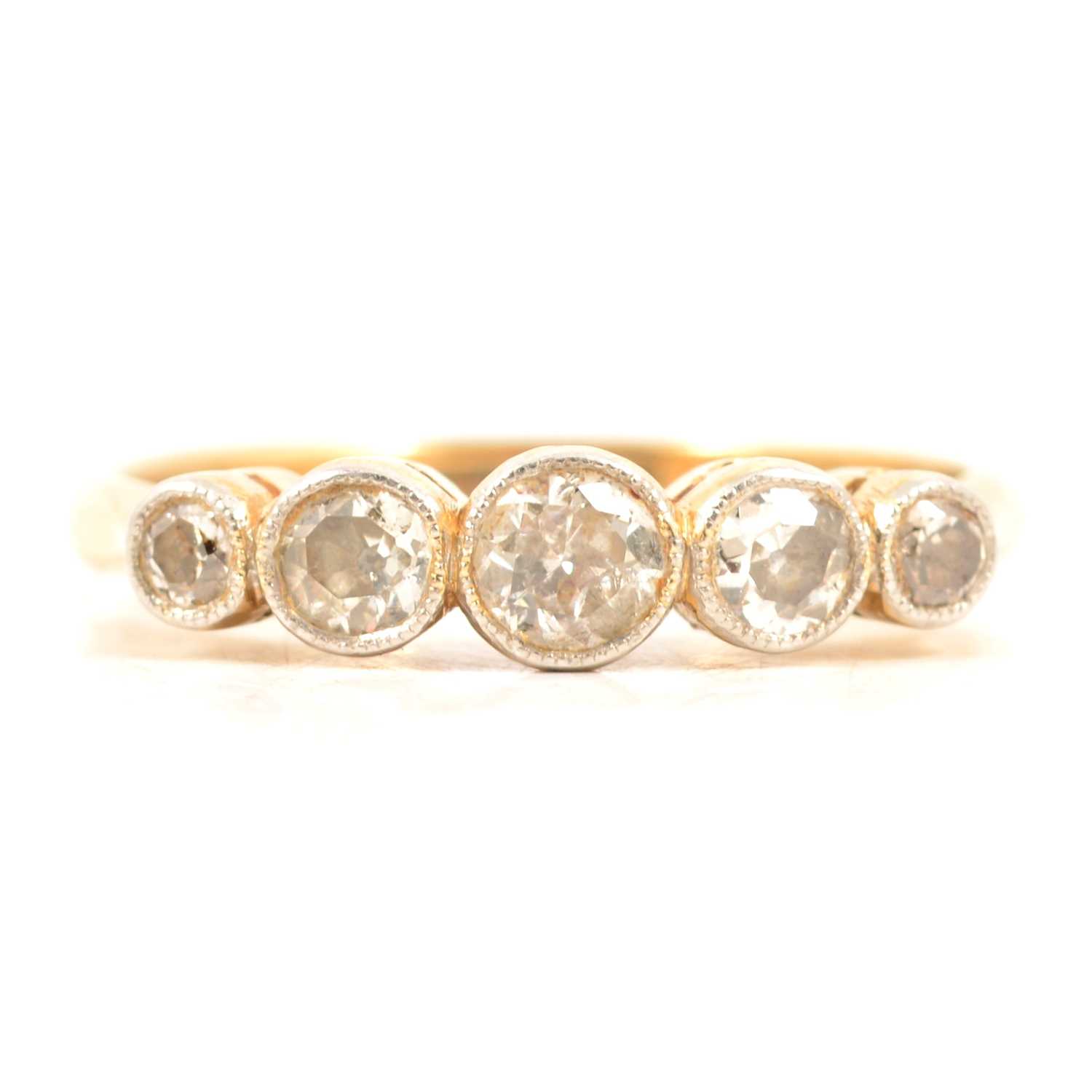 Lot 56 - A diamond five stone ring.