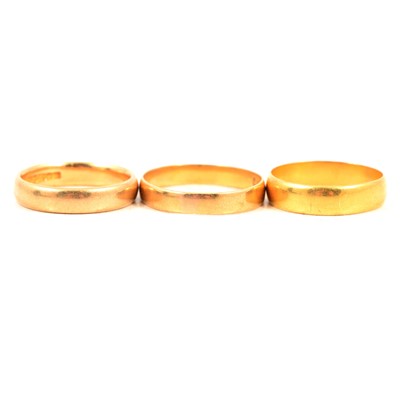 Lot 108 - Three 22 carat yellow gold wedding bands.