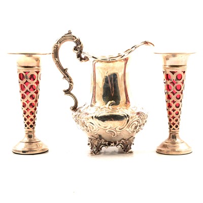 Lot 286 - Victorian silver cream jug, and a pair of silver spill vases, cranberry glass liners