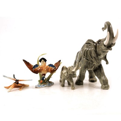 Lot 21 - Two Hutschenreuther elephants, duck and dragonfly.