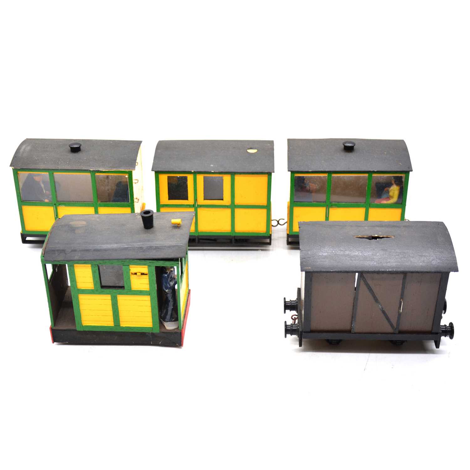 Lot 220 - Home made O gauge narrow gauge tram and four coach set, each length 14cm.