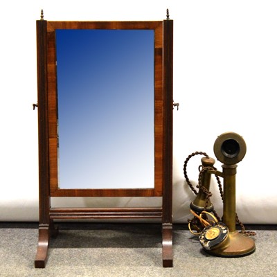 Lot 504 - A candlestick telephone and a mahogany framed swing toilet mirror.