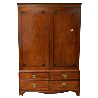 Lot 259 - Late Georgian mahogany wardrobe.