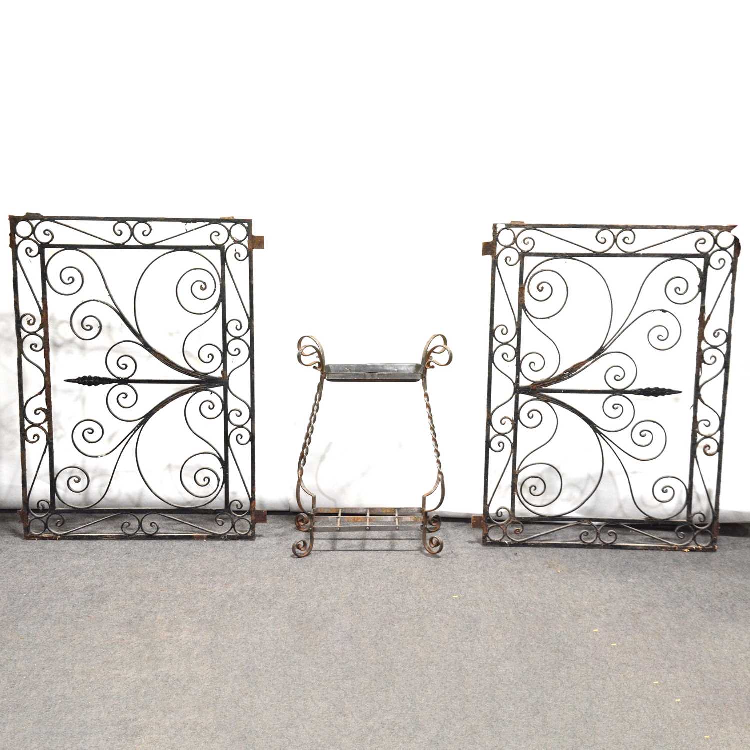 Lot 358 - Pair of French style wrought iron panels and a metal stick stand