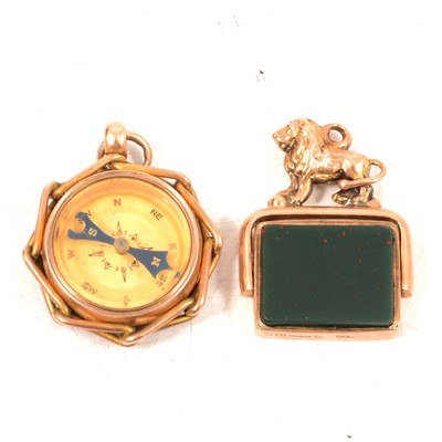 Lot 349 - A 9 carat gold compass charm and a bloodstone fob.