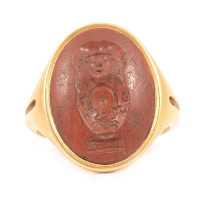 Lot 116 - A signet ring with intaglio carved jasper.