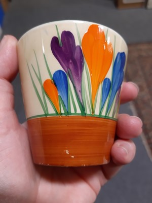 Lot 19 - Clarice Cliff, a small quantity of 'Crocus' pattern breakfast ware