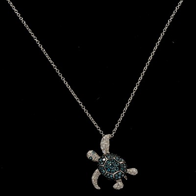 Lot 213 - Effy - a Turtle design white metal, diamond and blue diamond pendant and chain.