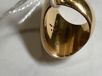 Lot 201 - Nanna Ditzel for Georg Jensen - a yellow metal abstract ring.