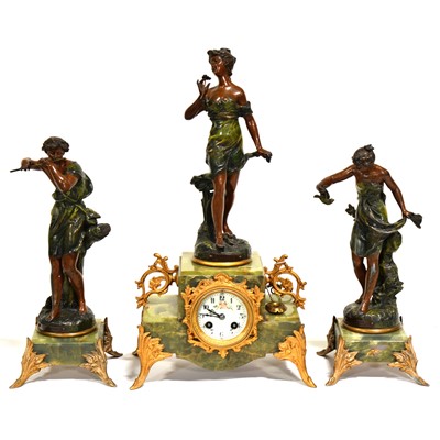 Lot 538 - French onyx and patinaed spelter clock garniture