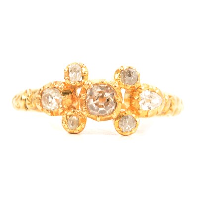 Lot 51 - A diamond set dress ring.