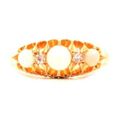 Lot 79 - An opal and diamond half hoop ring.