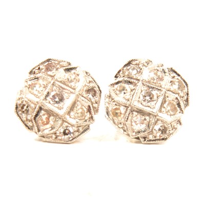 Lot 308 - A pair of diamond cluster earrings.