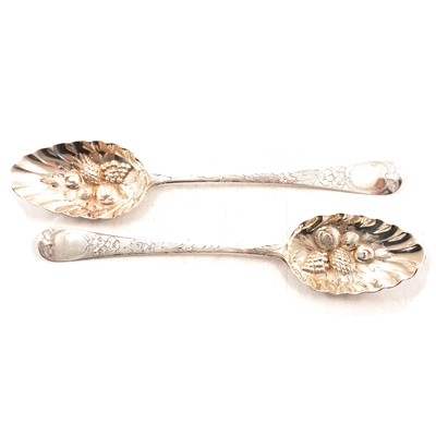 Lot 282 - Matched pair of Georgian silver berry spoons, William Eley I & William Fearn, London 1803 and 1804.