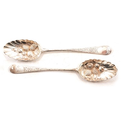 Lot 281 - Two Georgian silver berry spoons, indistinct maker's marks, London 1799 and 1805.