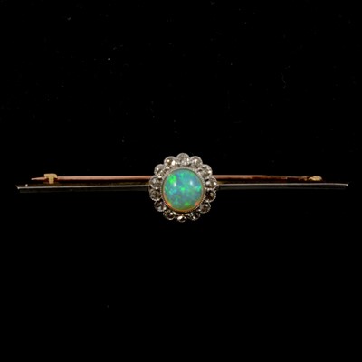 Lot 181 - An opal and diamond bar brooch.