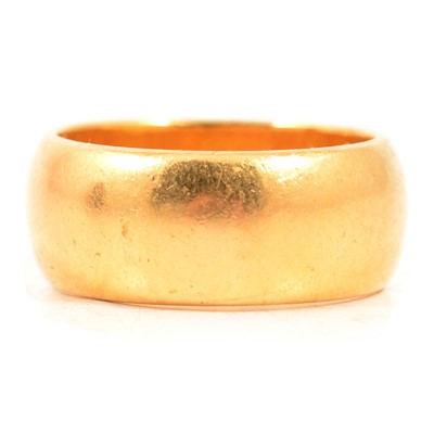 Lot 97 - A 22 carat yellow gold wedding band.