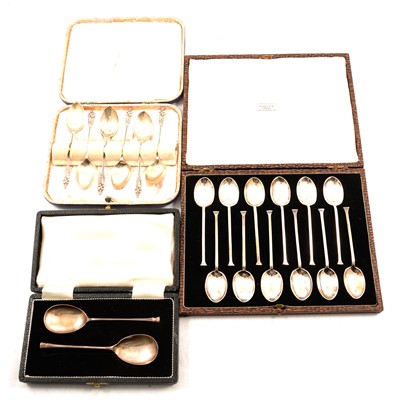 Lot 365 - Three cased sets of silver spoons.