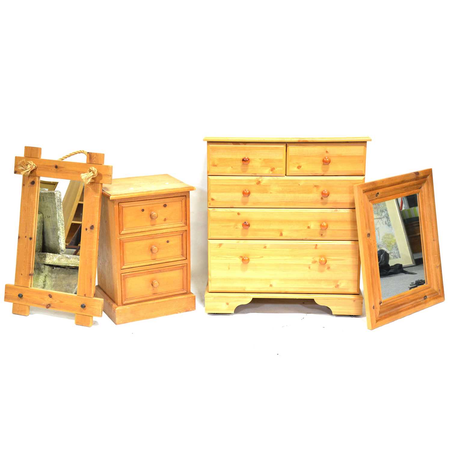 Lot 541 - Modern pine effect chest of drawers, two mirrors and a bedside cabinet