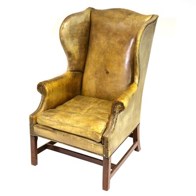 Lot 220 - Georgian style wing-back armchair